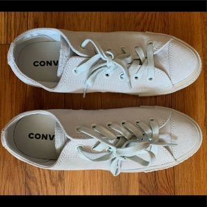 Lightly worn pastel teal converse